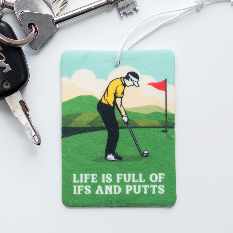An ideal gift for a golfer, this funny car air freshener features a golf illustration and golf pun