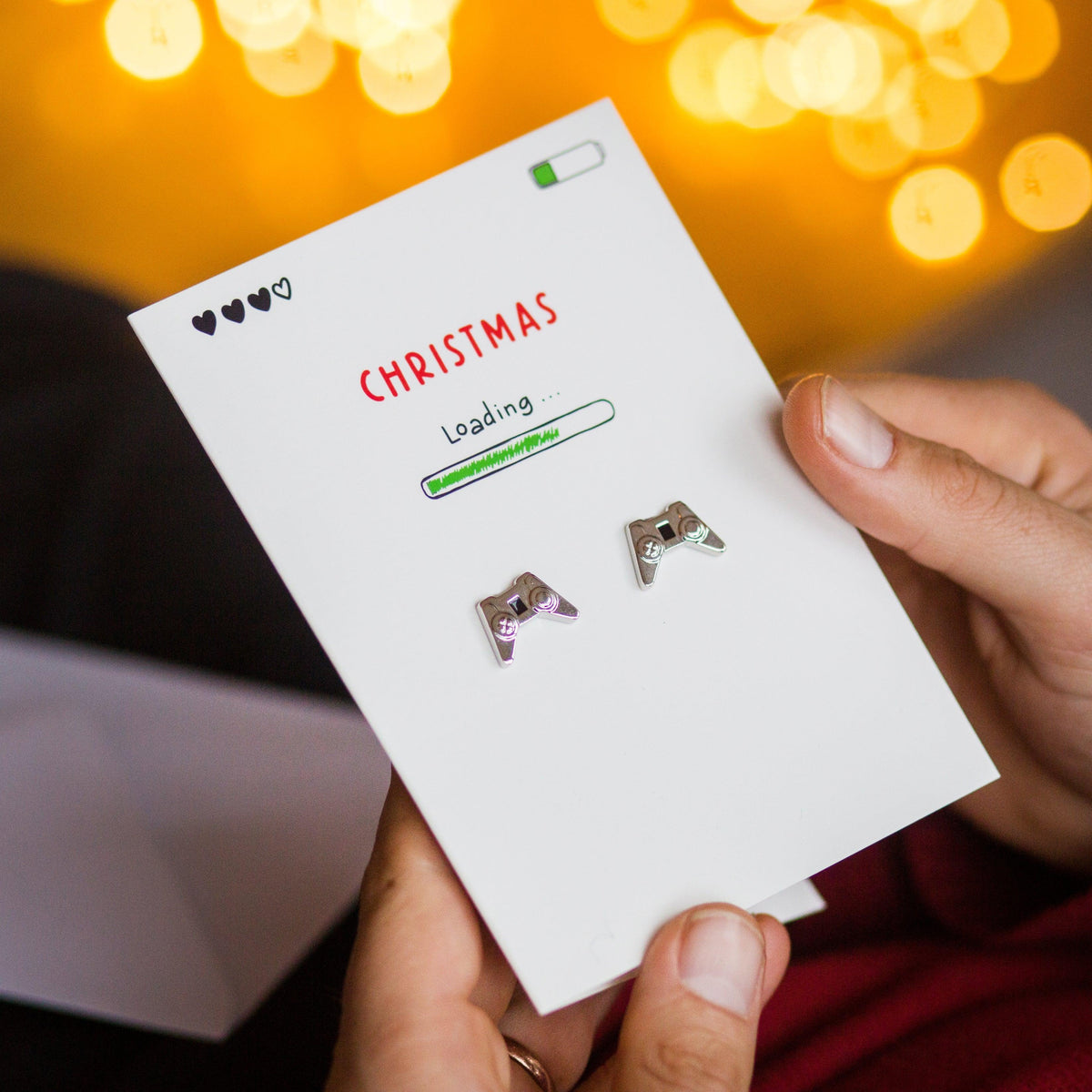 christmas card with cufflinks attached