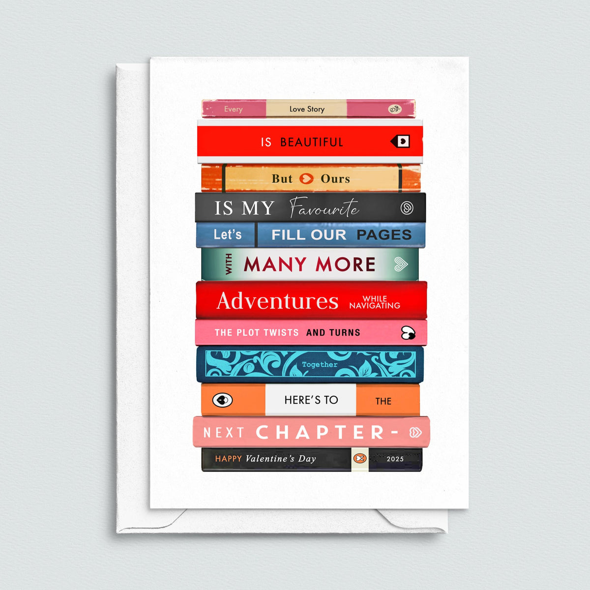 Book themed Valentine's Day card featuring a romantic message spelt out on a series of books